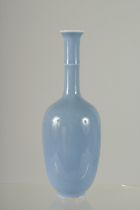 A SMALL CHINESE PALE BLUE VASE. 7ins, high.
