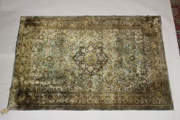 A PERSIAN STYLE RUG, turquoise ground with all stylised floral decoration. 6ft 8ins x 4ft 5ins.