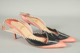 A PAIR OF CHRISTIAN LEBOUTIN PINK AND BLACK SHOES. Size UK 37.