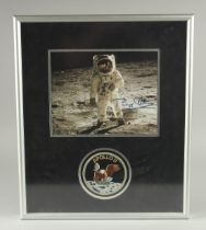 A SIGNED PHOTOGRAPH OF BUZZ ALDRIN. 8ins x 9.5ins.