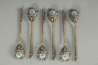 A SET OF SIX RUSSIAN SILVER AND ENAMEL SPOONS. 10.5cm long. Marks: 84. K.P. Weight: 60gms.