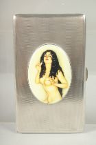 AN ENGINE TURNED SILVER CIGARETTE CASE. Birmingham, 1946 with an nude with long hair.
