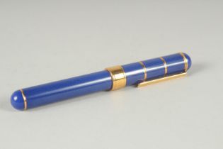 AN YVES ST. LAURENT BLUE FOUNTAIN PEN in box.