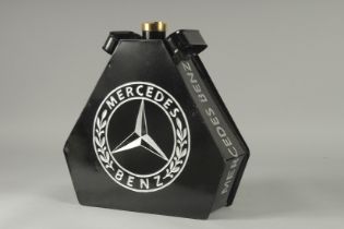 A MERCEDES OIL CAN.