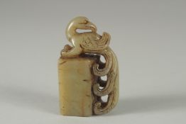 A CHINESE CARVED JADE BIRD SEAL.