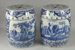 A GOOD PAIR OF CHINESE BLUE AND WHITE BARREL SEATS. 16ins high.