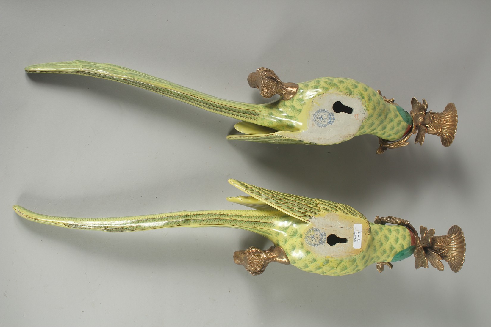 A GOOD PAIR OF PORCELAIN GREEN PARROT WALL SCONCES with gilt metal surrounds. 18.5ins long. - Image 4 of 4