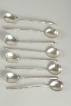 A SET OF EIGHT ENGRAVED RUSSIAN SILVER SPOONS. 5ins long, maker: A. A. over 1896, 84. 110grms.