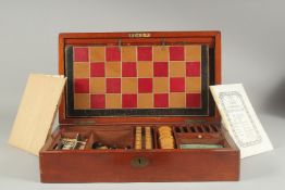 A GOOD VICTORIAN MAHOGNAY CASED GAMES COMPENDIUM, chess, dominoes, cribage, cards etc.