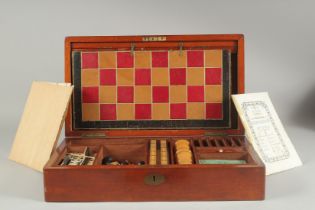 A GOOD VICTORIAN MAHOGNAY CASED GAMES COMPENDIUM, chess, dominoes, cribage, cards etc.