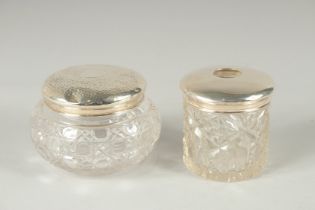 A SILVER TOP STRING TIDY and a silver top cut glass powder bowl (2).