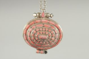 AN EASTERN WHITE METAL BOX with chain, of stepped form, inset with pink hardstones