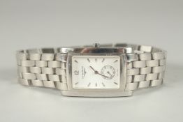 A GENTLEMAN'S LONGINES WRIST WATCH with stainless steal bracelet. Purchased on 30/12/1999, Charles