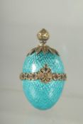 A VERY GOOD RUSSIAN SILVER AND ENAMEL EGG PENDANT. Possibly Faberge. 5cm.