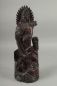 A CHINESE CARVED WOOD GUANYIN. 23ins high.