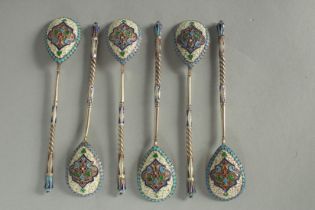 A SET OF SIX RUSSIAN SILVER AND ENAMEL SPOONS. 13cm long. Marks: 84, K.P. Weight: 60gms.