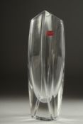 A GOOD BACCARAT ROUNDED GLASS VASE. 10ins long, Signed, with label, in original box.(appears
