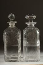 TWO GEORGIAN SQUARE DECANTERS AND STOPPERS. 9ins high.