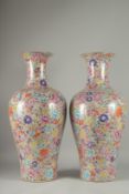 A LARGE PAIR OF MILLEFIORE PORCELAIN VASES. 27ins high.