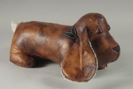 A SOFT ANIMAL DOOR STOP, DOG with long ears.