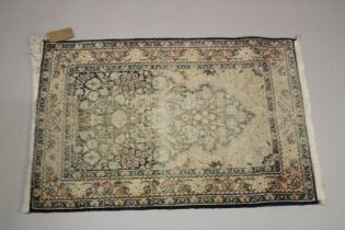 A SMALL PERSIAN PART SILK PRAYER RUG (WORN). 3ft 1ins x 2ft .