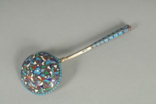A RUSSIAN SILVER AND ENAMEL SPOON, 18cm long. Mark: M R. Weighs: 60gms.