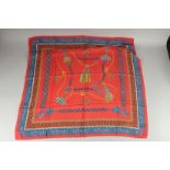 A FENDI RED AND BLUE ROPE SILK SCARF 33ins x 33ins.