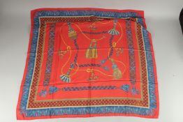A FENDI RED AND BLUE ROPE SILK SCARF 33ins x 33ins.