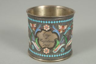 A RUSSIAN SILVER AND ENAMEL EGG CUP. 4.5cm diameter, 4.5ins high. Weight 33gms. Inscribed and dated,