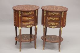 A GOOD PAIR OF LOUIS XVITH STYLE INLAID THREE DRAWER OVAL BEDSIDE CABINETS. 2ft 3ins high, 1ft