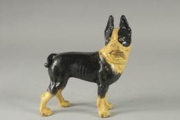 A CAST IRON BLACK AND WHITE DOG. 8ins high.