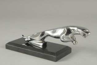 A JAGUAR CHROME CAR MASCOT. 7ins long on a marble base.