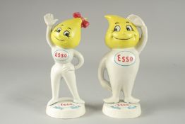 A PAIR OF PAINTED CAST IRON ESSO MONEY BOXES. 10ins high.