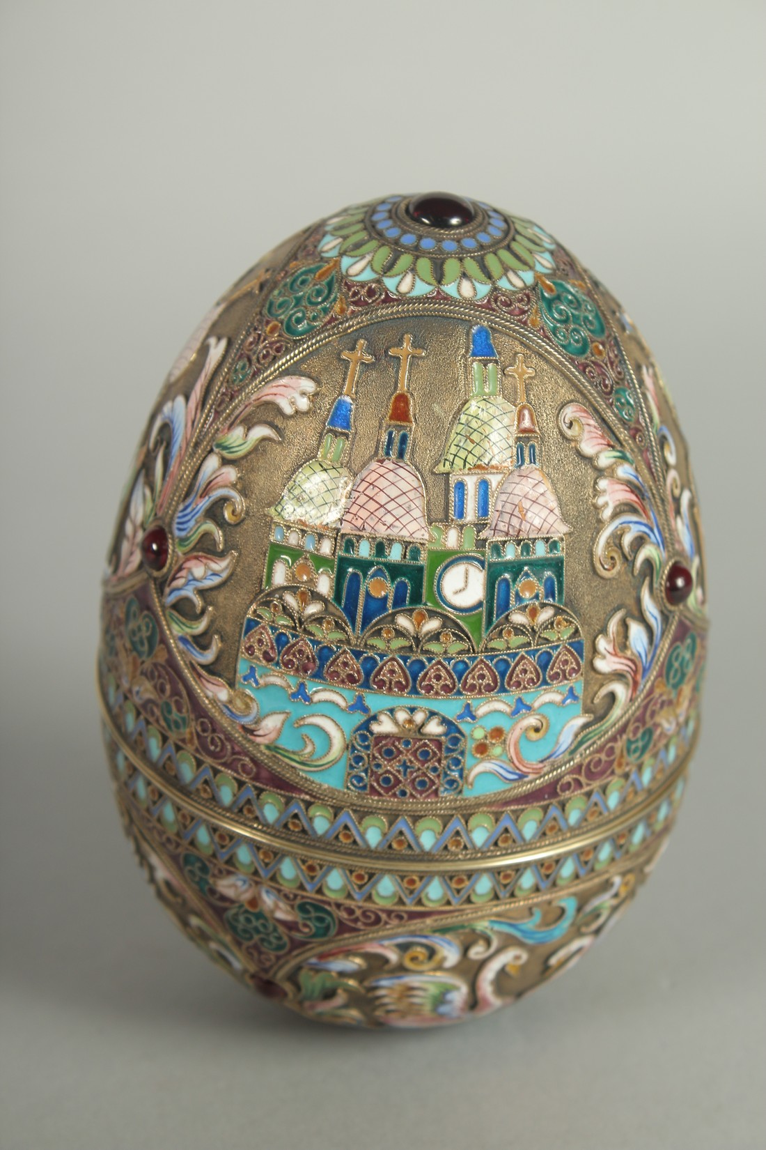 A LARGE RUSSIAN SILVER AND ENAMEL EGG, decorated with panels of white swans and Russian orthodox - Image 3 of 10