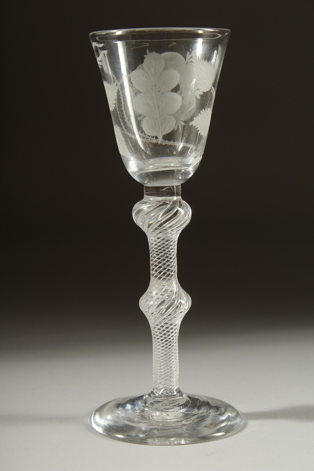 A SUPERB JACOBITE WINE GLASS the bowl engraved with roses, wtih air twist and knop stem. 6.5ins - Image 2 of 4