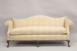 A LARGE CAMEL BACKED SOFA with padded loose cushions. 6ft 3ins long.