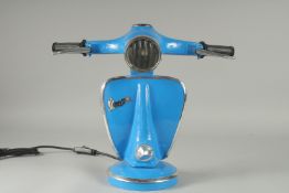 A BLUE VESPA LAMP. 13ins high.