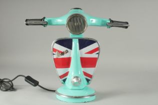 A GREEN UNION JACK VESPA LAMP. 13ins high.