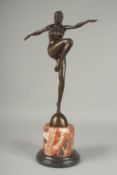 AFTER J PHILLIP. A BRONZE DANCING GIRL. Signed, 14ins on a stepped metal base. 17ins high.