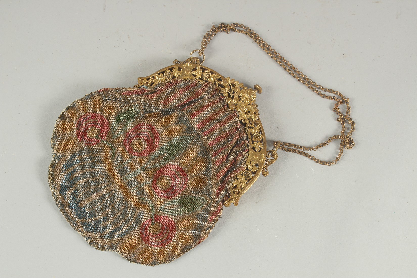 A VICTORIAN BEADED EVENING BAG.