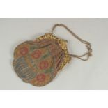 A VICTORIAN BEADED EVENING BAG.