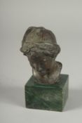 A SMALL BRONZE BUST OF A YOUNG MAN. Signed, 4ins high on a marble base.