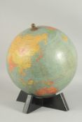 A JOHNSON AND BACON 12ins TERRESTRIAL GLOBE.