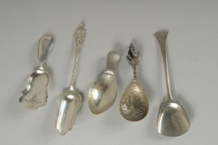 FIVE VARIOUS SILVER CADDY SPOONS.