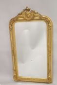 A GOOD GILTWOOD UPRIGHT MIRROR. 5ft high x 2ft 8ins wide.