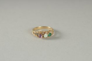 A 10CT GOLD OPAL AND AMETHYST RING.