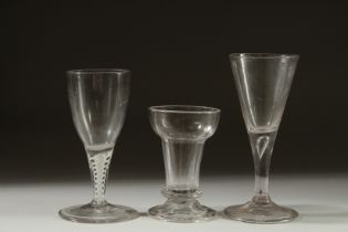 THREE VARIOUS SMALL GEORGIAN GLASSES. 3.25ins, 4.25ins & 4.5ins high.