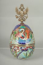 A RUSSIAN SILVER AND ENAMEL EGG (matching previous lot). 10cm long Mark: Head, 84, C.K. Weight: