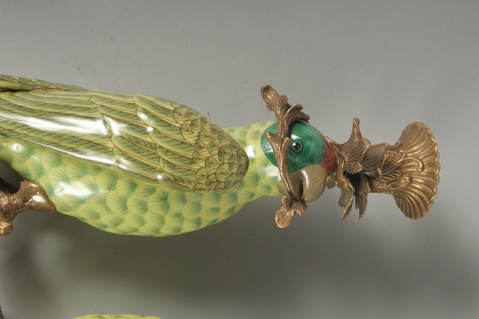 A GOOD PAIR OF PORCELAIN GREEN PARROT WALL SCONCES with gilt metal surrounds. 18.5ins long. - Image 2 of 4
