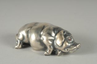 A RUSSIAN SILVER PIG. Mark: Head, I P. Faberge. 7cm long, 27gms.